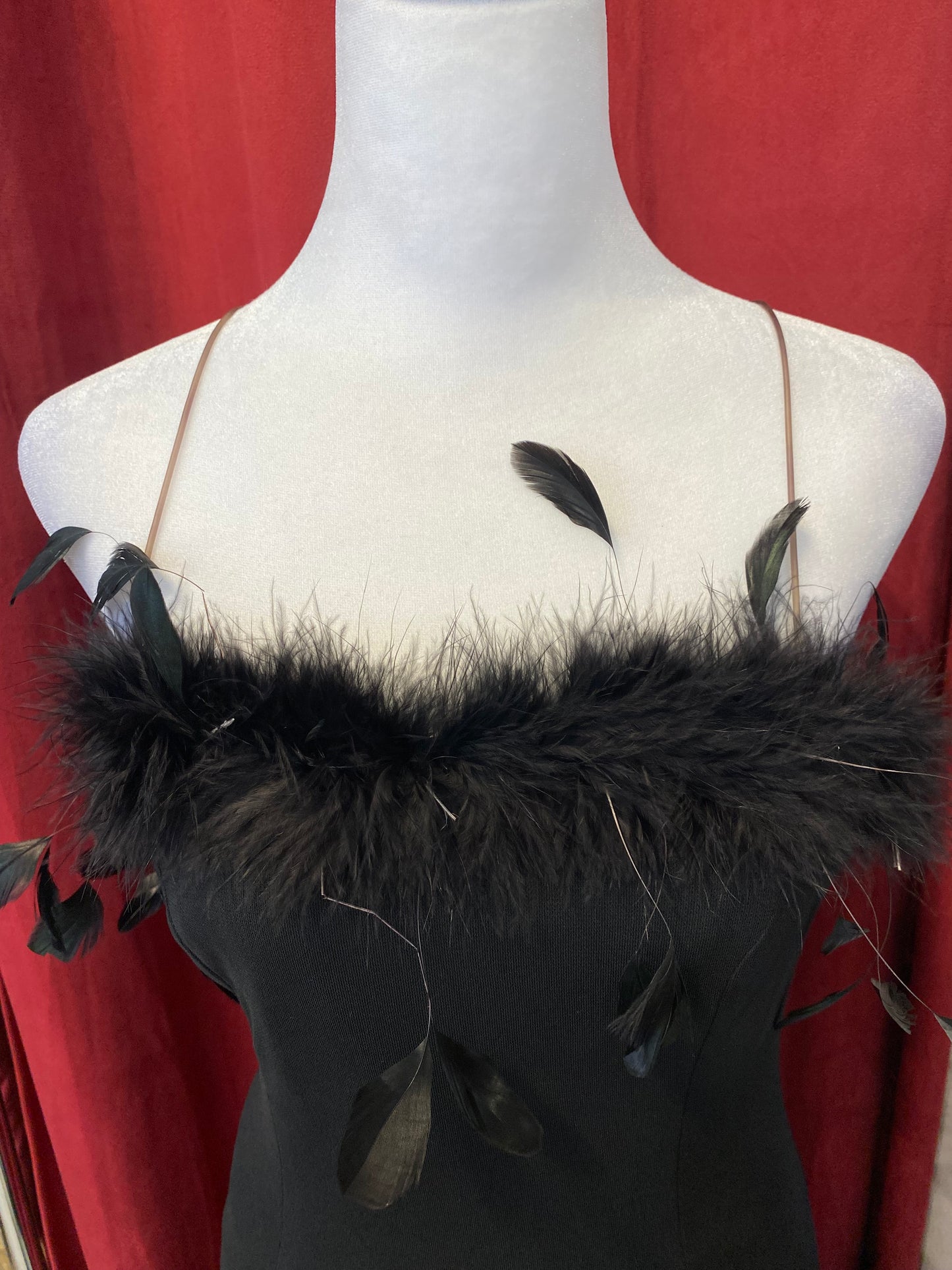 Brand new black gown with feather details