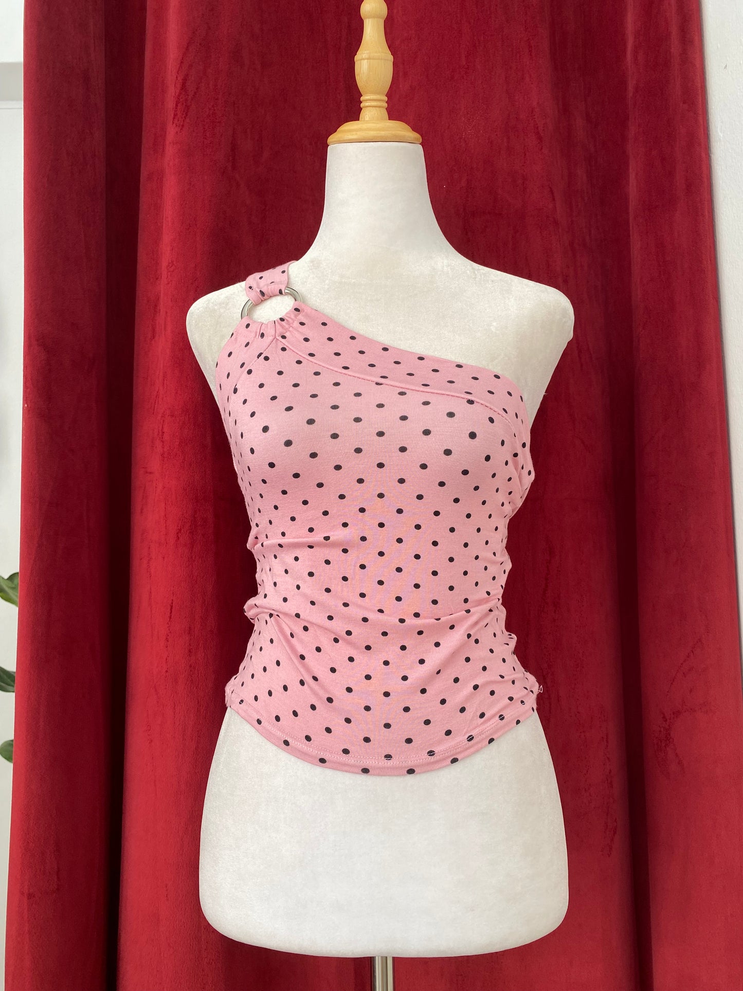 Pink one shoulder polka dot top