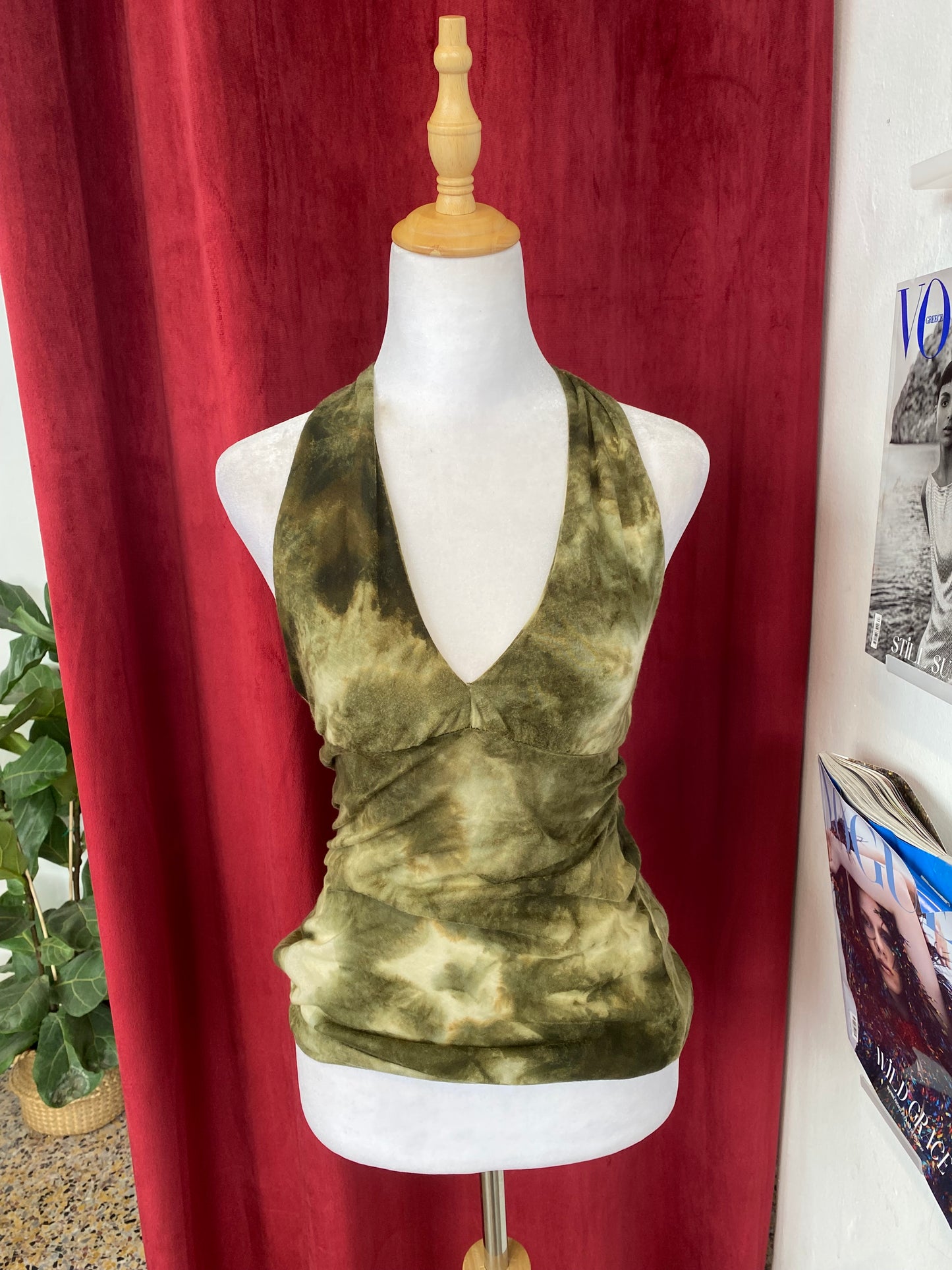 Fairy open back green top