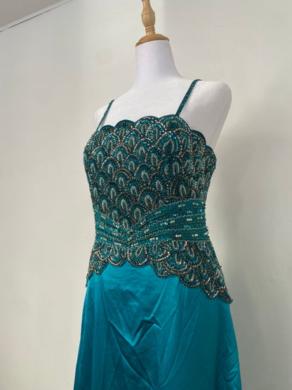 Brand new petrol gown with all over handbeaded details on the bust