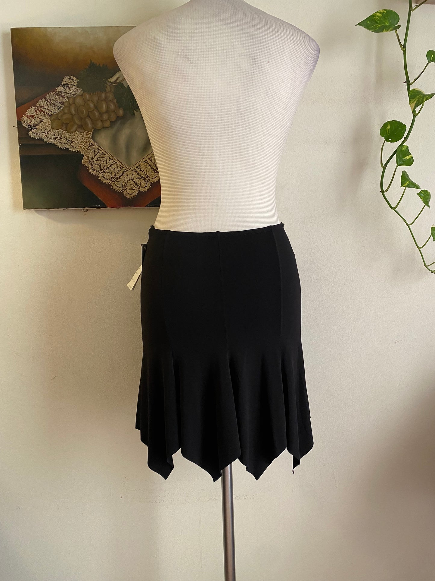 Brand new black asymmetrical mini skirt