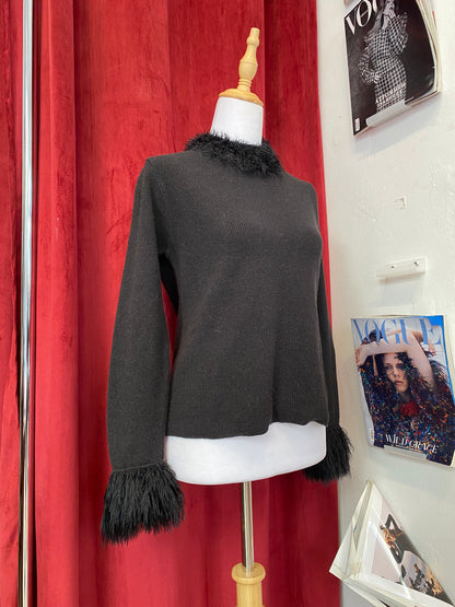 Black knitted top with fur details on collar and sleeves