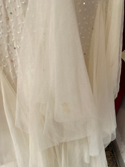 100% silk floor length gown with all over handbeaded details