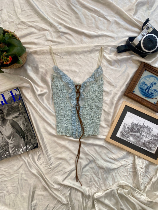 Baby blue rushed top with brown lace up details 🦋