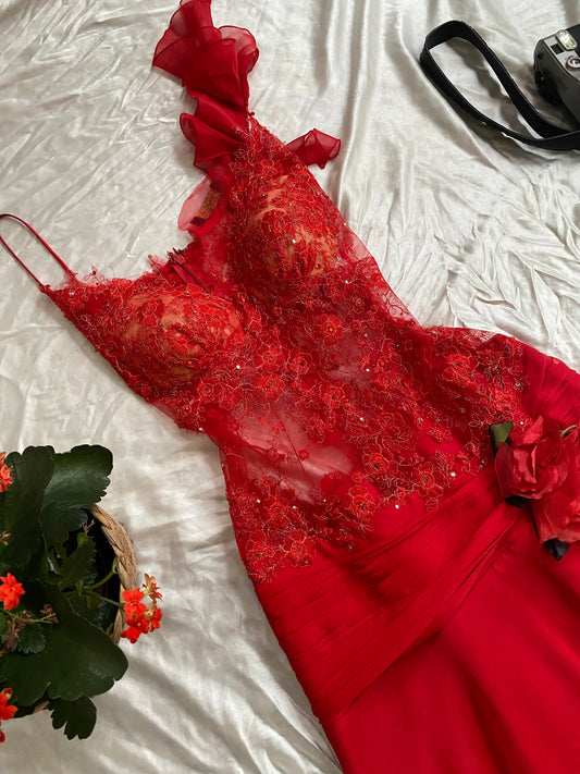 Red handbeaded gown with all over sequin details