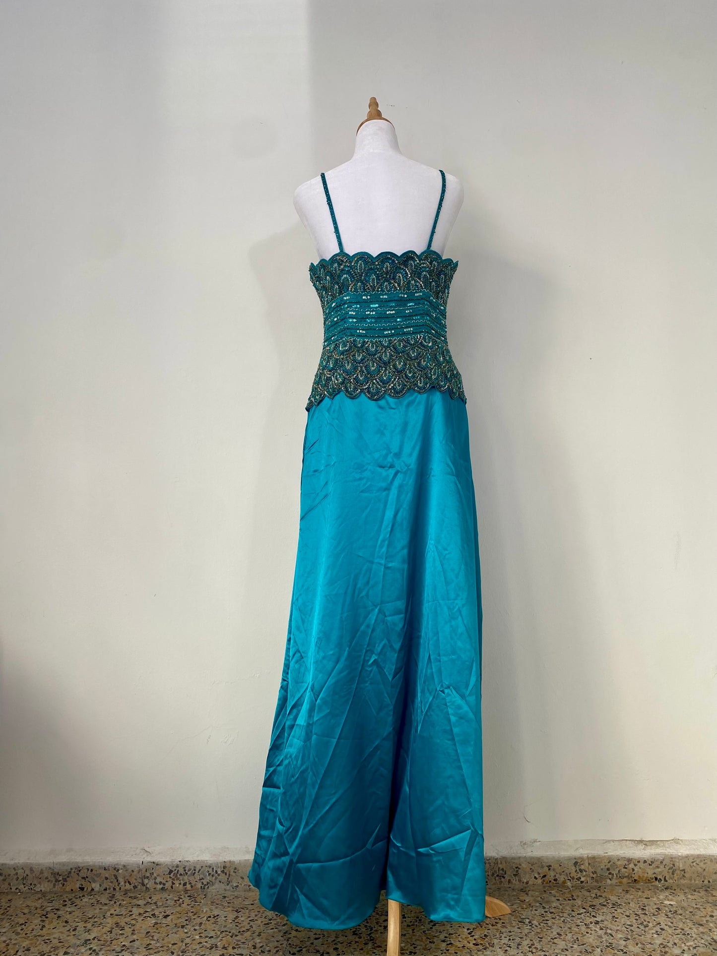 Brand new petrol gown with all over handbeaded details on the bust