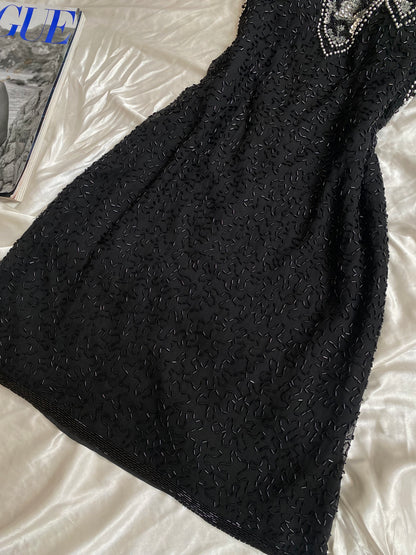 100% silk black dress with all over handbeaded details