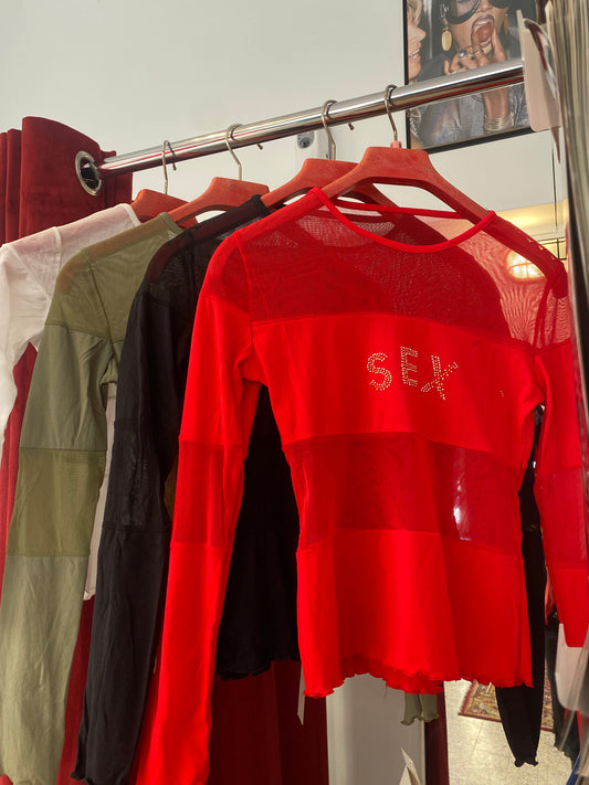 Brand new sheer top with sequin”sex” logo