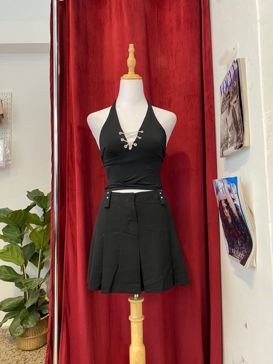 Mini black ruffled skirt with rhinestone details