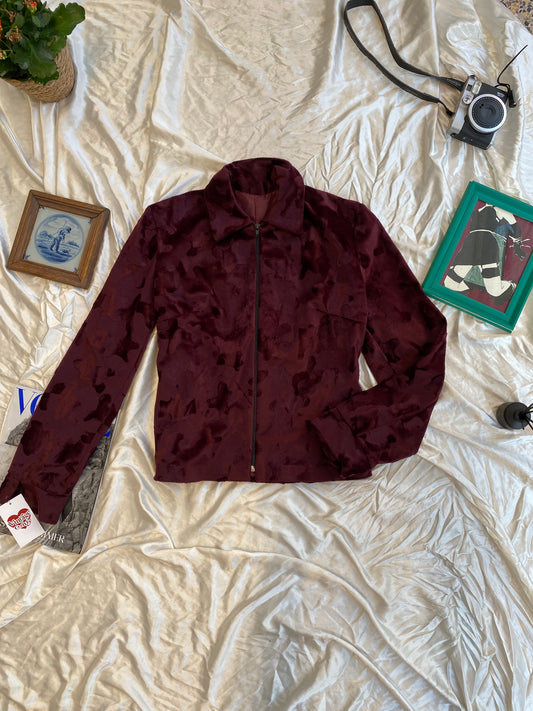 Deep burgundy faux fur jacket with cow print details