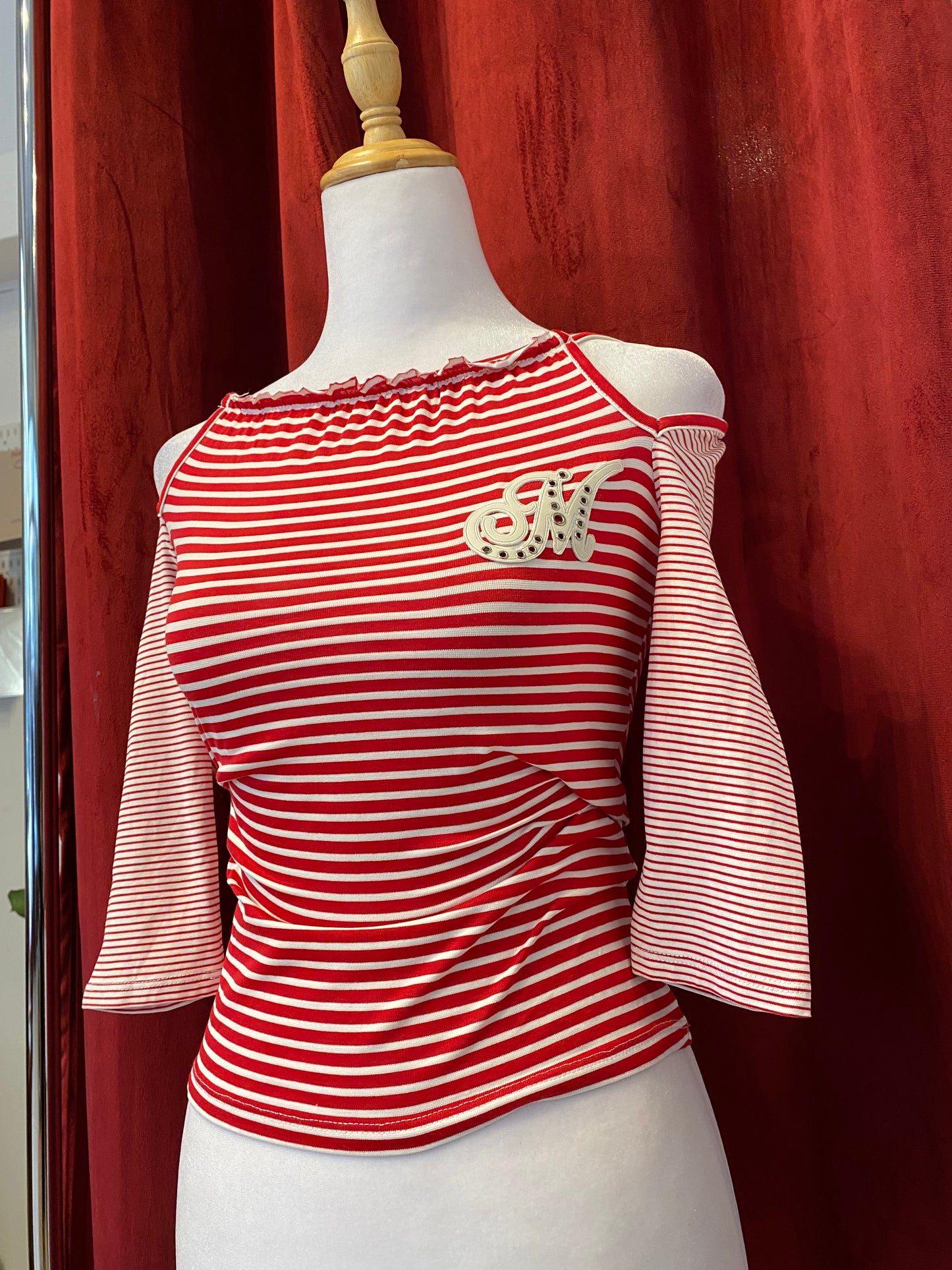 Morgan stripped red top with off the shoulder details
