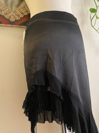 Brand new black asymmetrical satin skirt with fringe details