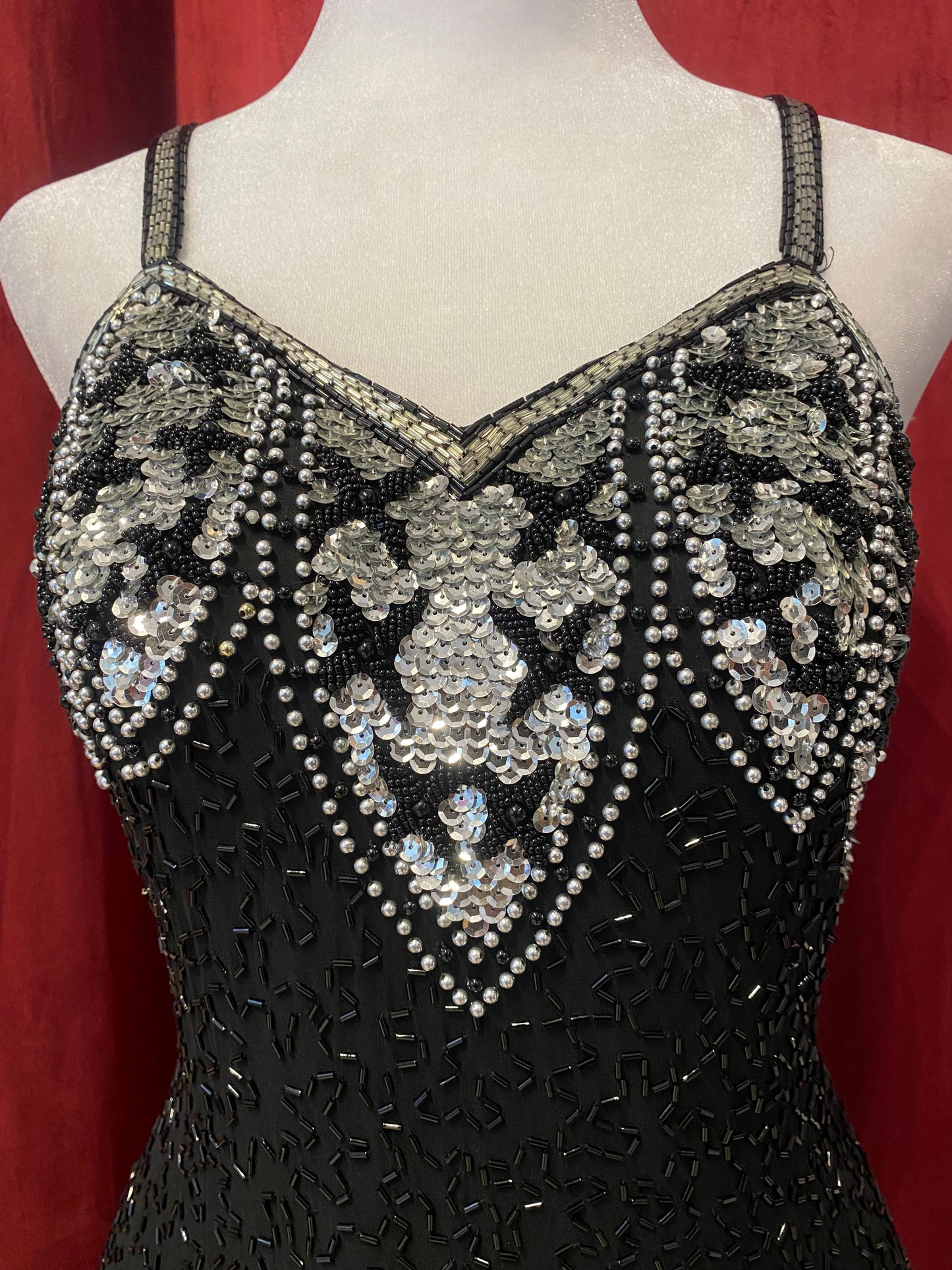 100% silk black dress with all over handbeaded details