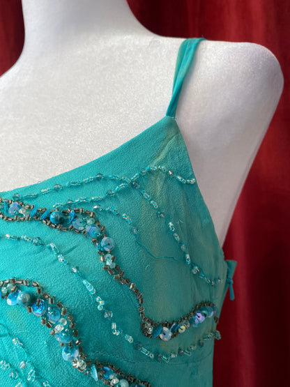 100% silk handbeaded gown with ruffles details