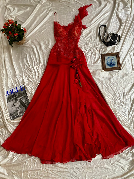Red handbeaded gown with all over sequin details