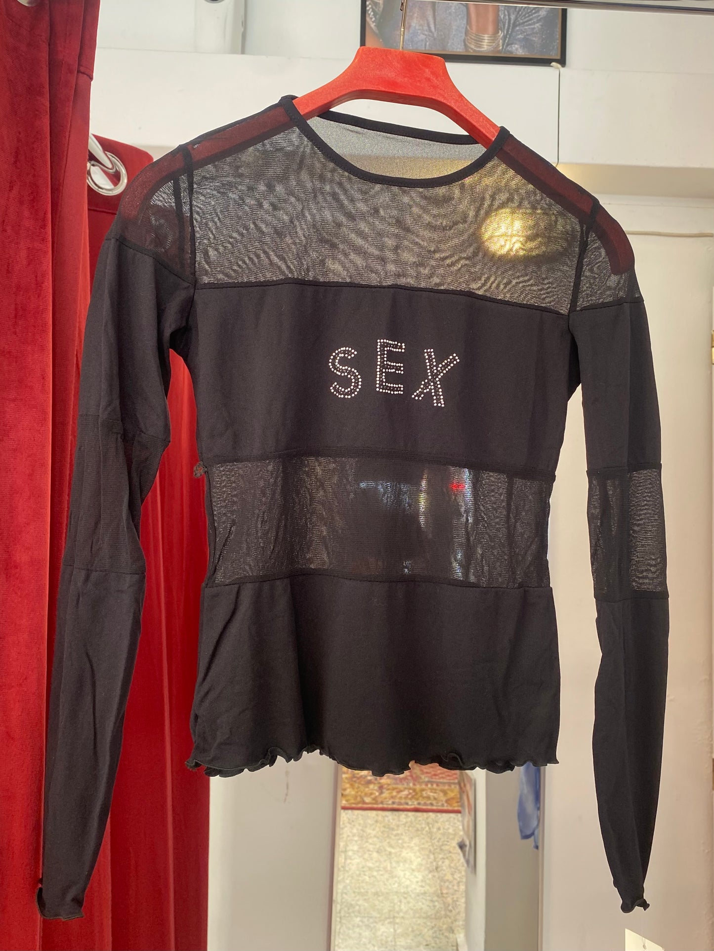 Brand new sheer top with sequin”sex” logo