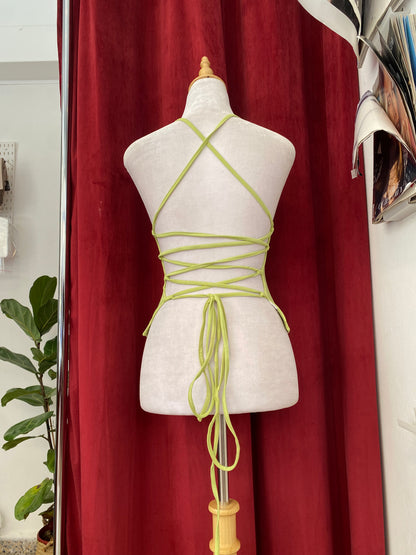 Open back light green top