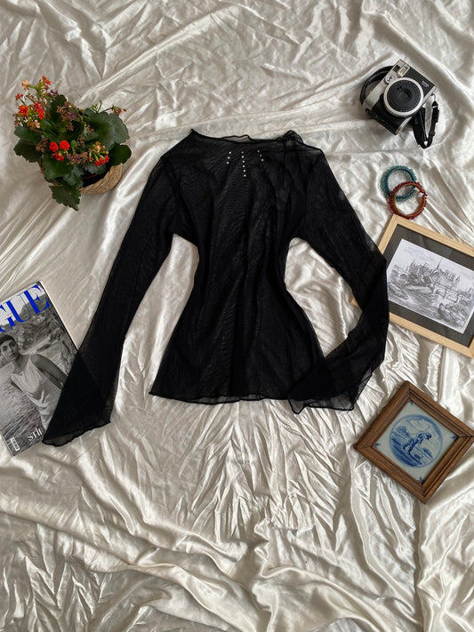Sheer black top with rhinestone details