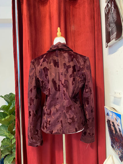 Deep burgundy faux fur jacket with cow print details