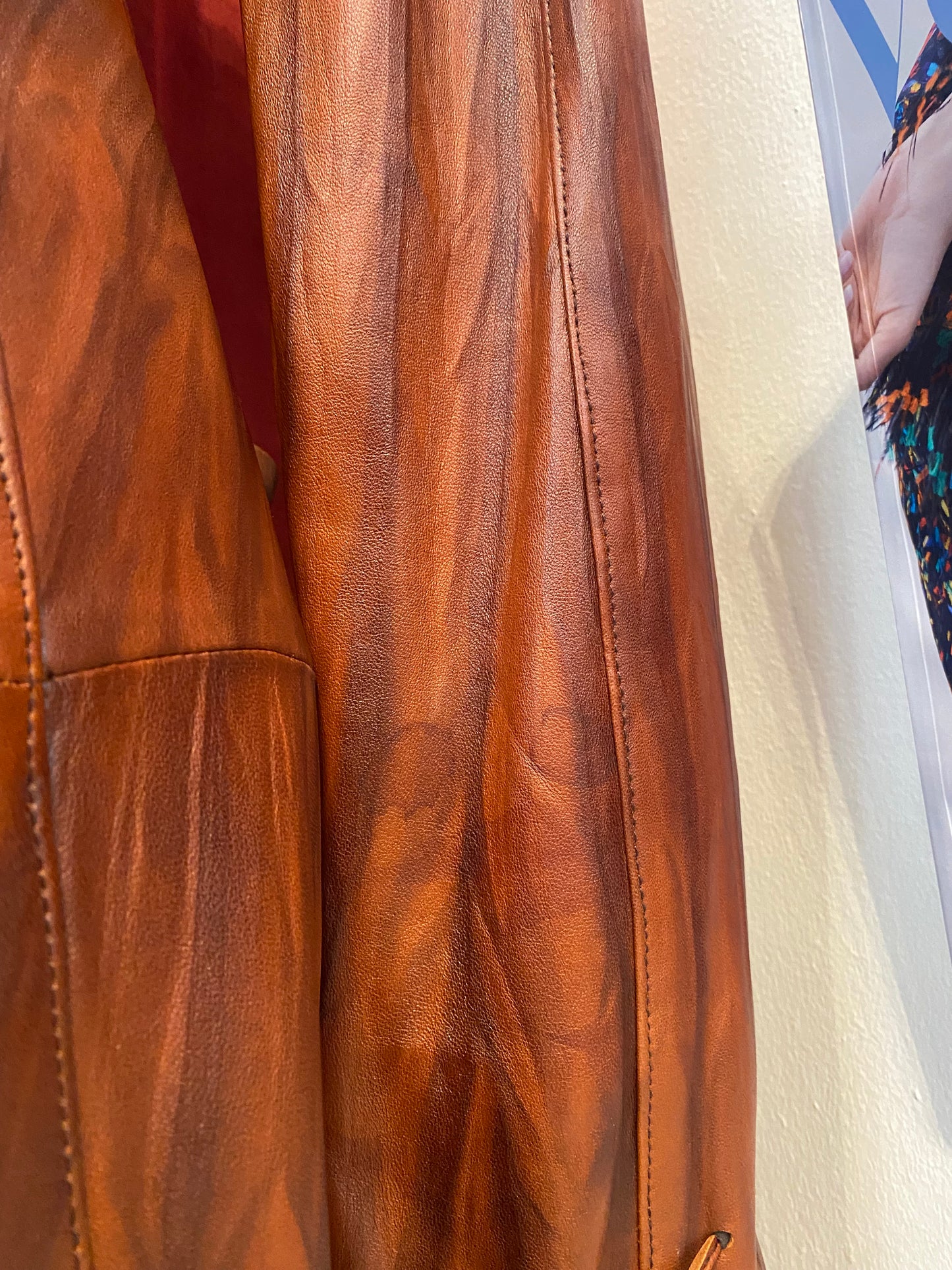Elegant brown leather coat with intricate details 🥃