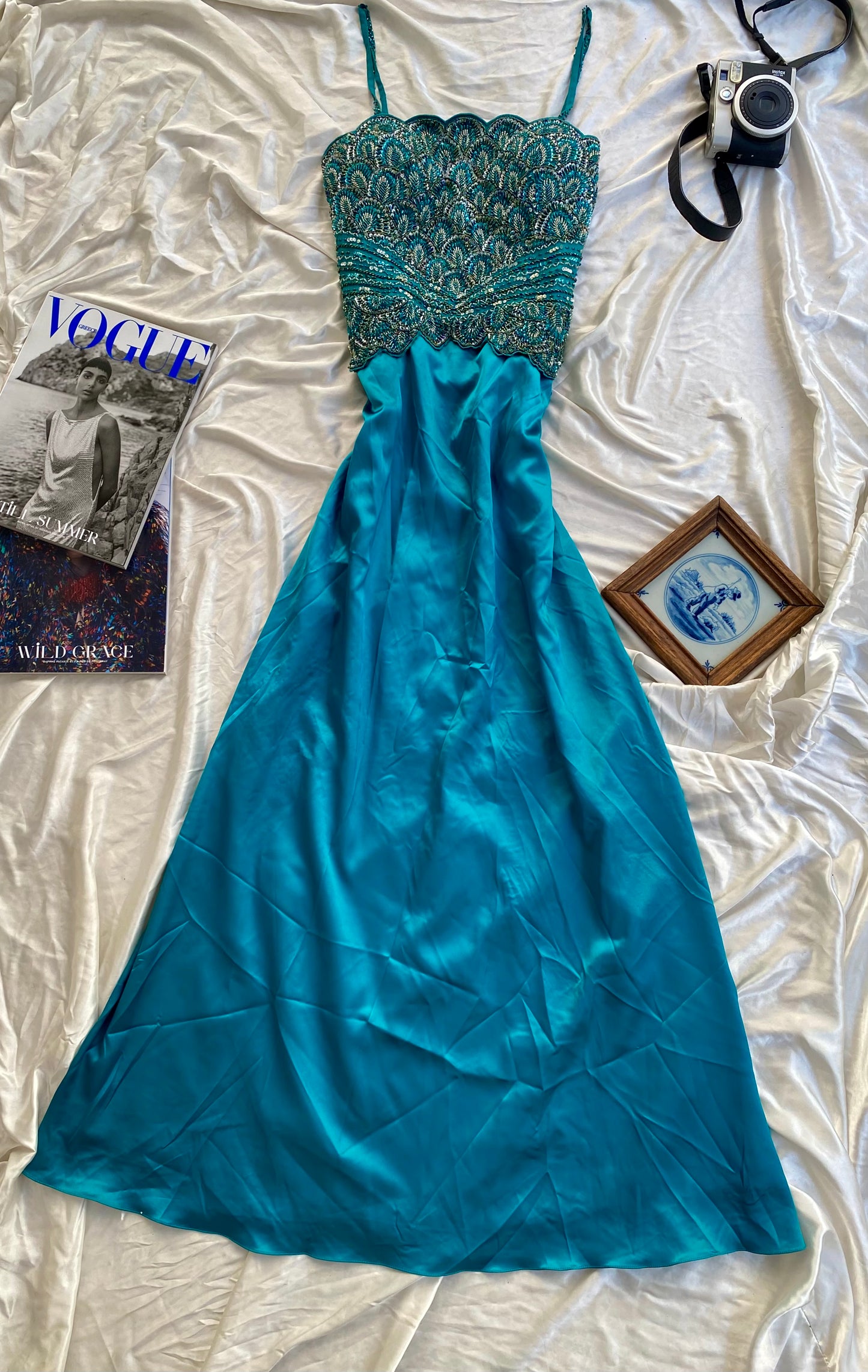 Brand new petrol gown with all over handbeaded details on the bust