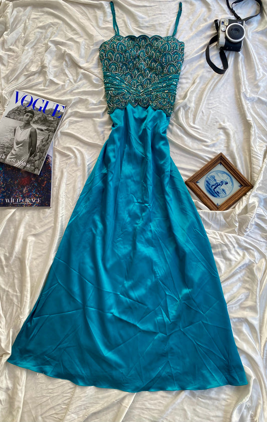 Brand new petrol gown with all over handbeaded details on the bust