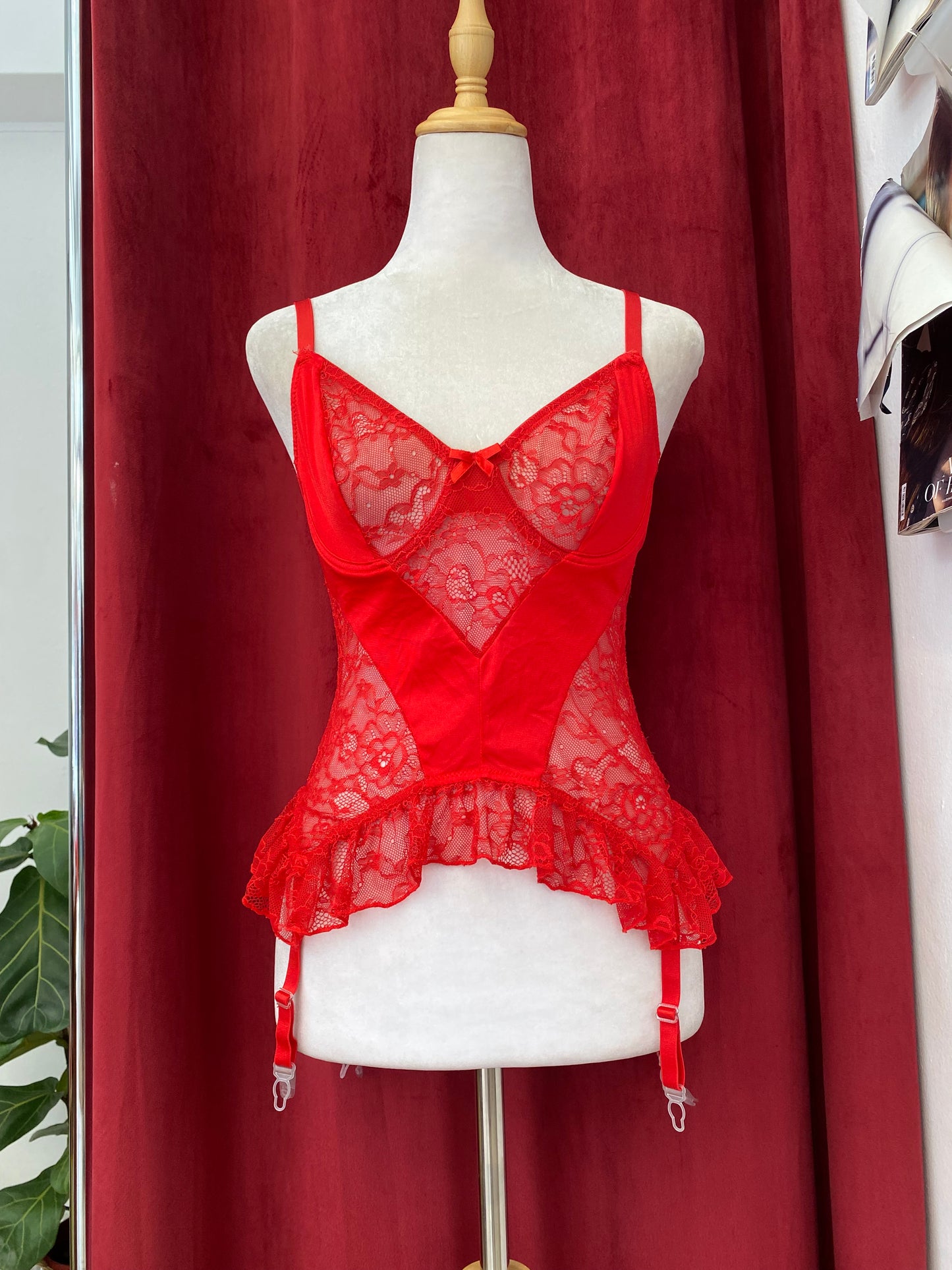 Intricate red lace corset