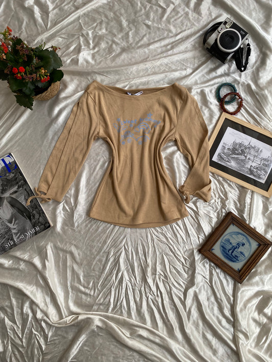 Beige cotton top with graphic design