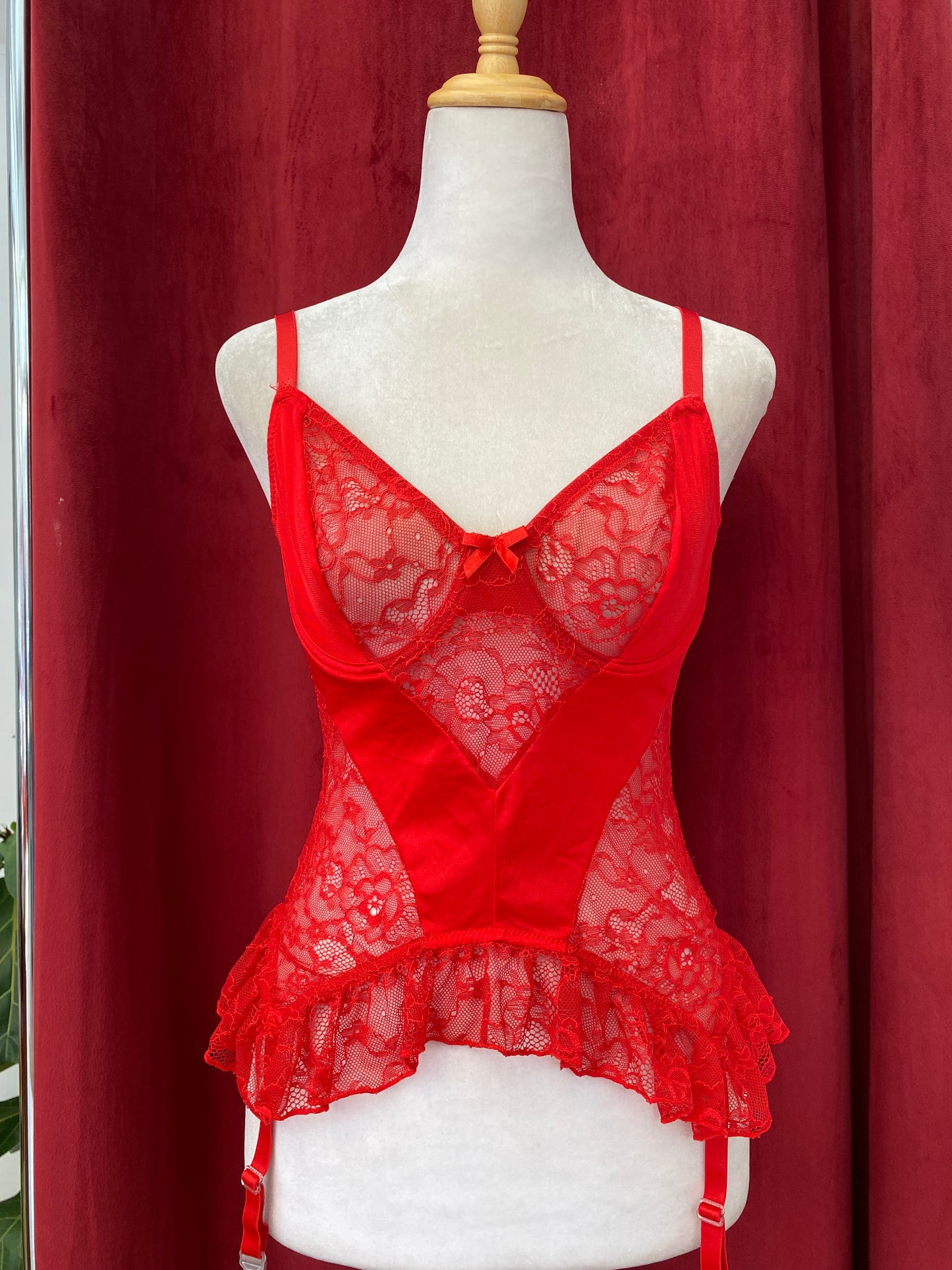 Intricate red lace corset