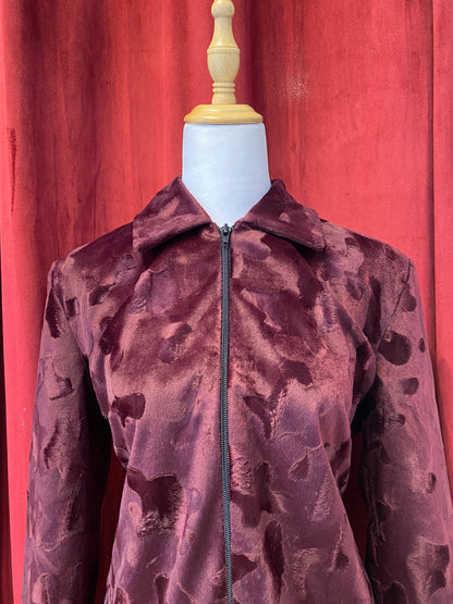 Deep burgundy faux fur jacket with cow print details