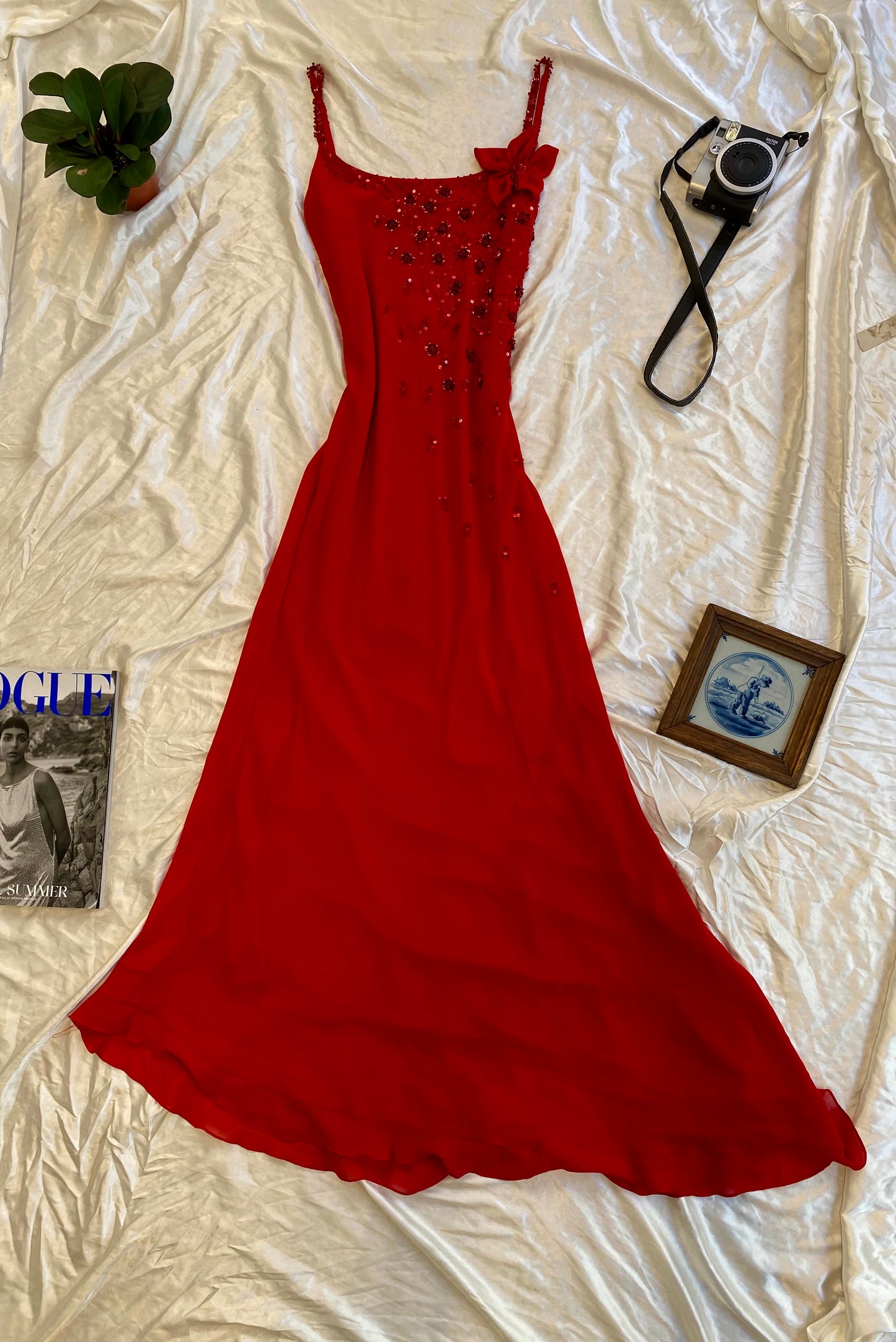 Brand new maxi dress with sequin and flower details