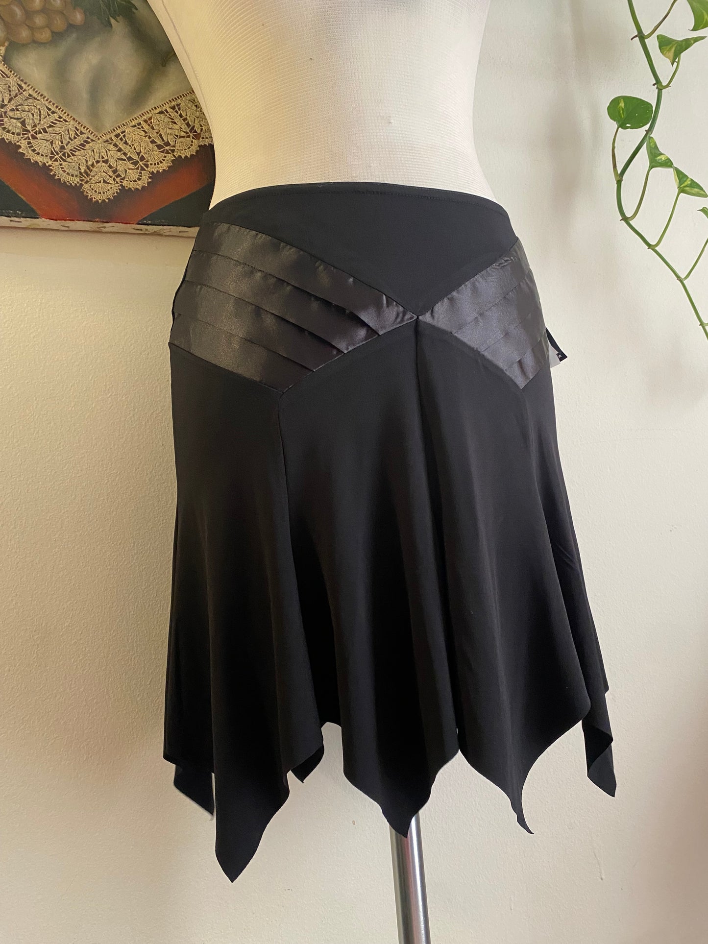 Brand new black asymmetrical mini skirt