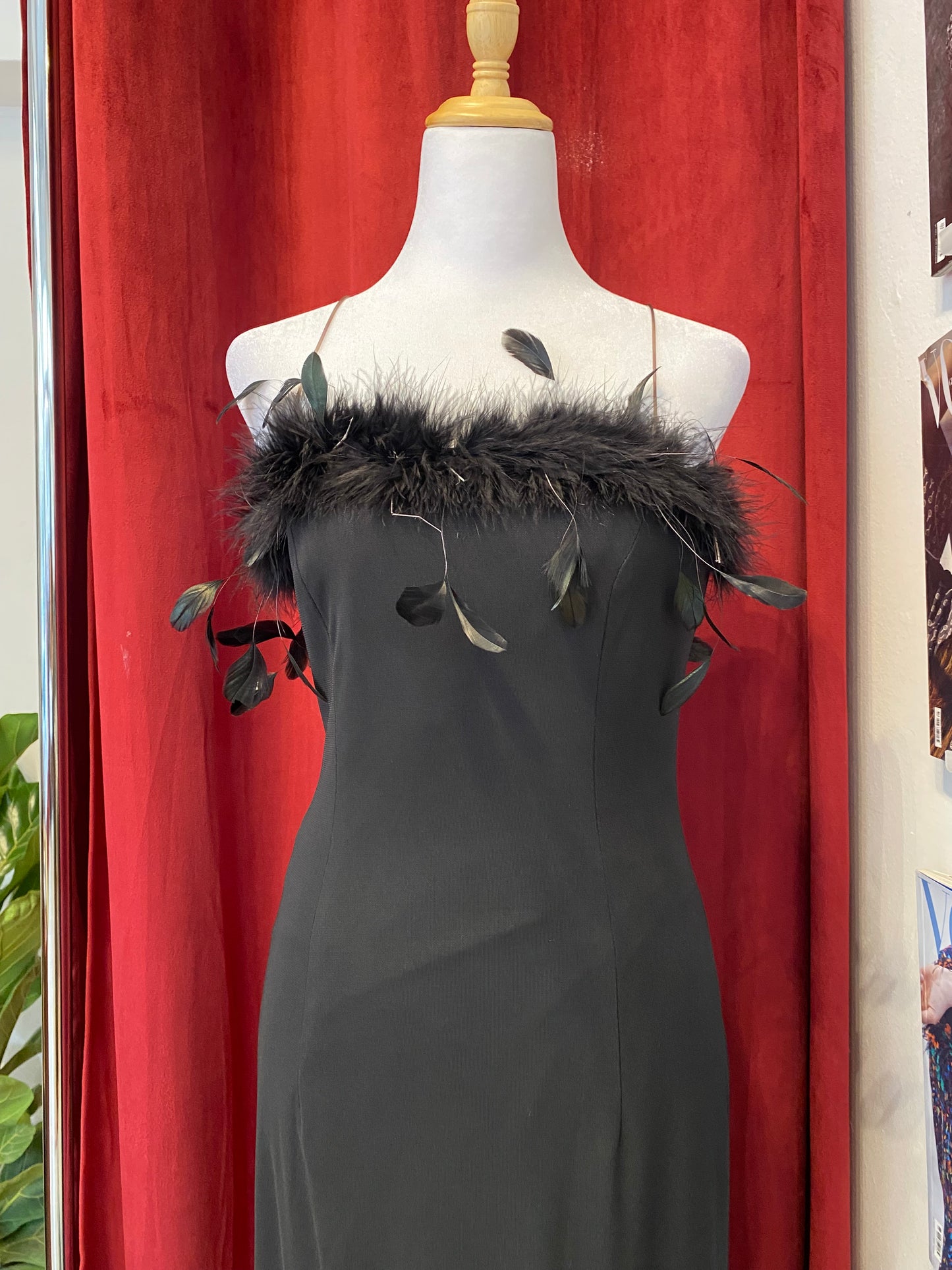 Brand new black gown with feather details