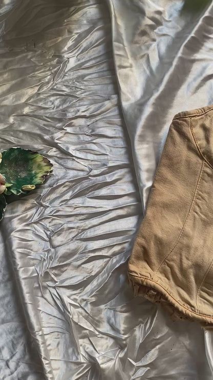 Denim corset with washed out details