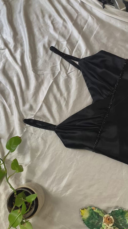 Black midi gown with sequin details