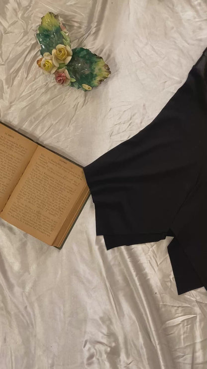 Brand new black asymmetrical mini skirt