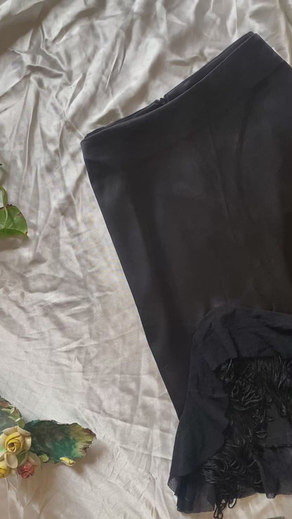 Brand new black asymmetrical satin skirt with fringe details